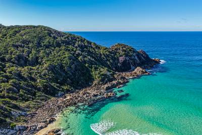 Aerial scene capturing Charlotte Head at Boomerang Beach near Pacific Palms, NSW, Australia